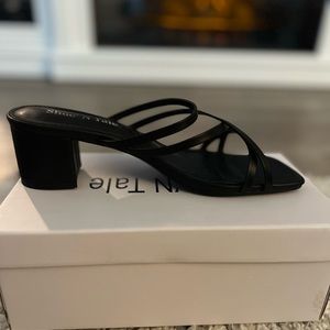Brand new, never worn black heels. They run narrow-size 7